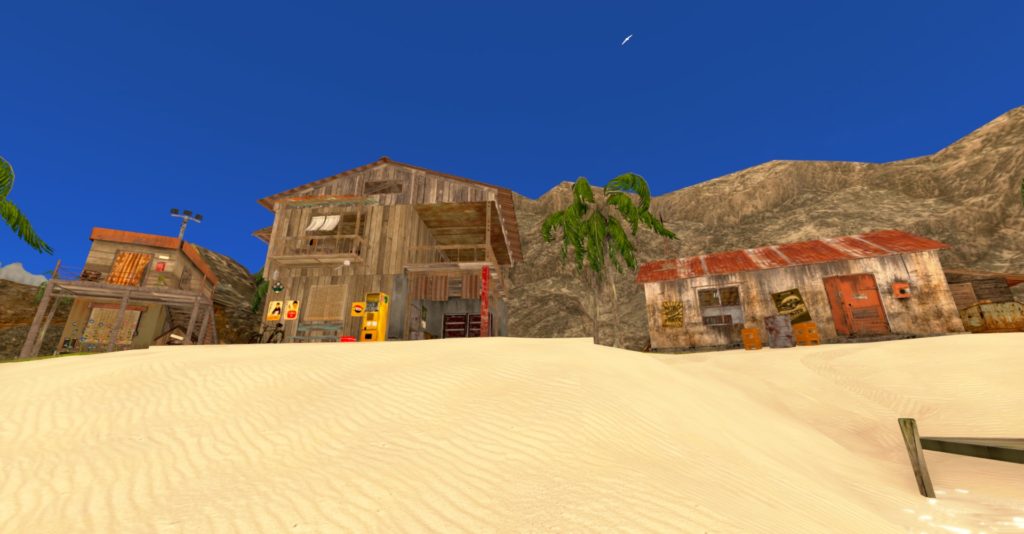 図８．海岸近くの砂浜にボロ屋が３軒、軒を連ねる